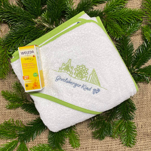 Geschenkset: 1 Baby-Kapuzentuch mit Weleda Pflegecreme